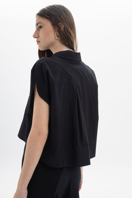 Cropped Button Shirt with relaxed fit, classic collar, and cap sleeves, perfect for summer styling.
