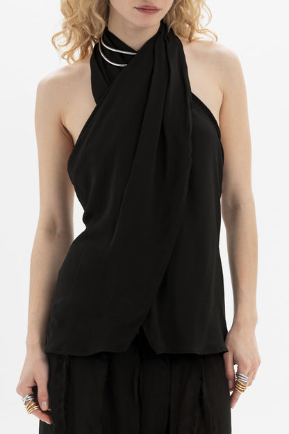 Draped Halter Top featuring a softly draped neckline and open-back silhouette, enhancing elegance and movement.
