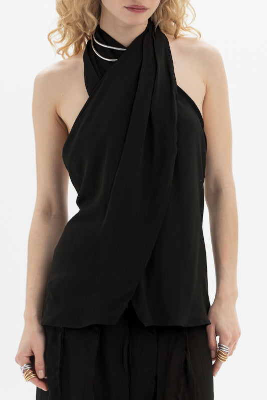 Draped Halter Top featuring a softly draped neckline and open-back silhouette, enhancing elegance and movement.