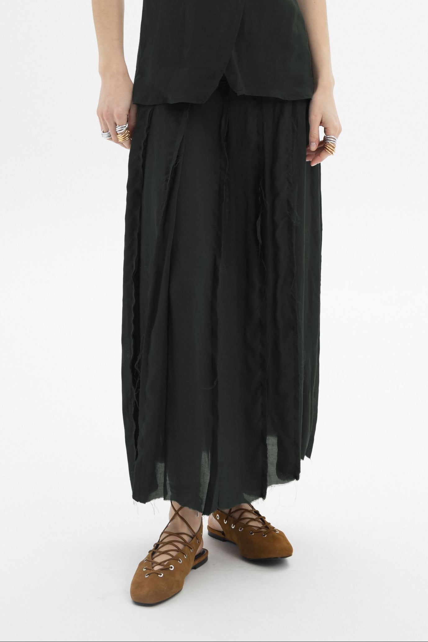Sheer Layered Maxi Skirt with flowing layers and sheer outer layer, perfect for daytime and evening styling.
