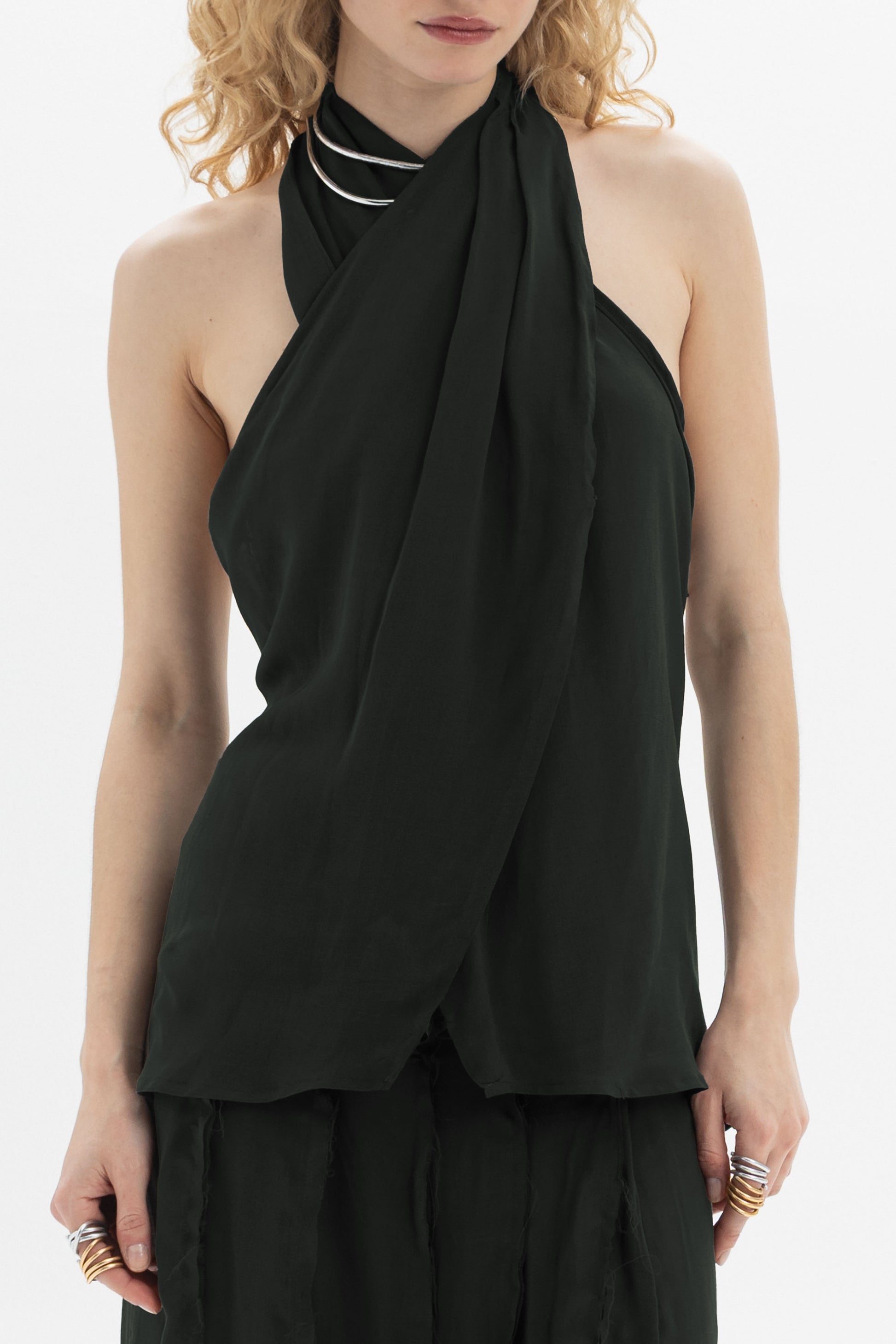 Draped Halter Top featuring a softly draped neckline and an open-back silhouette in a lightweight fabric.