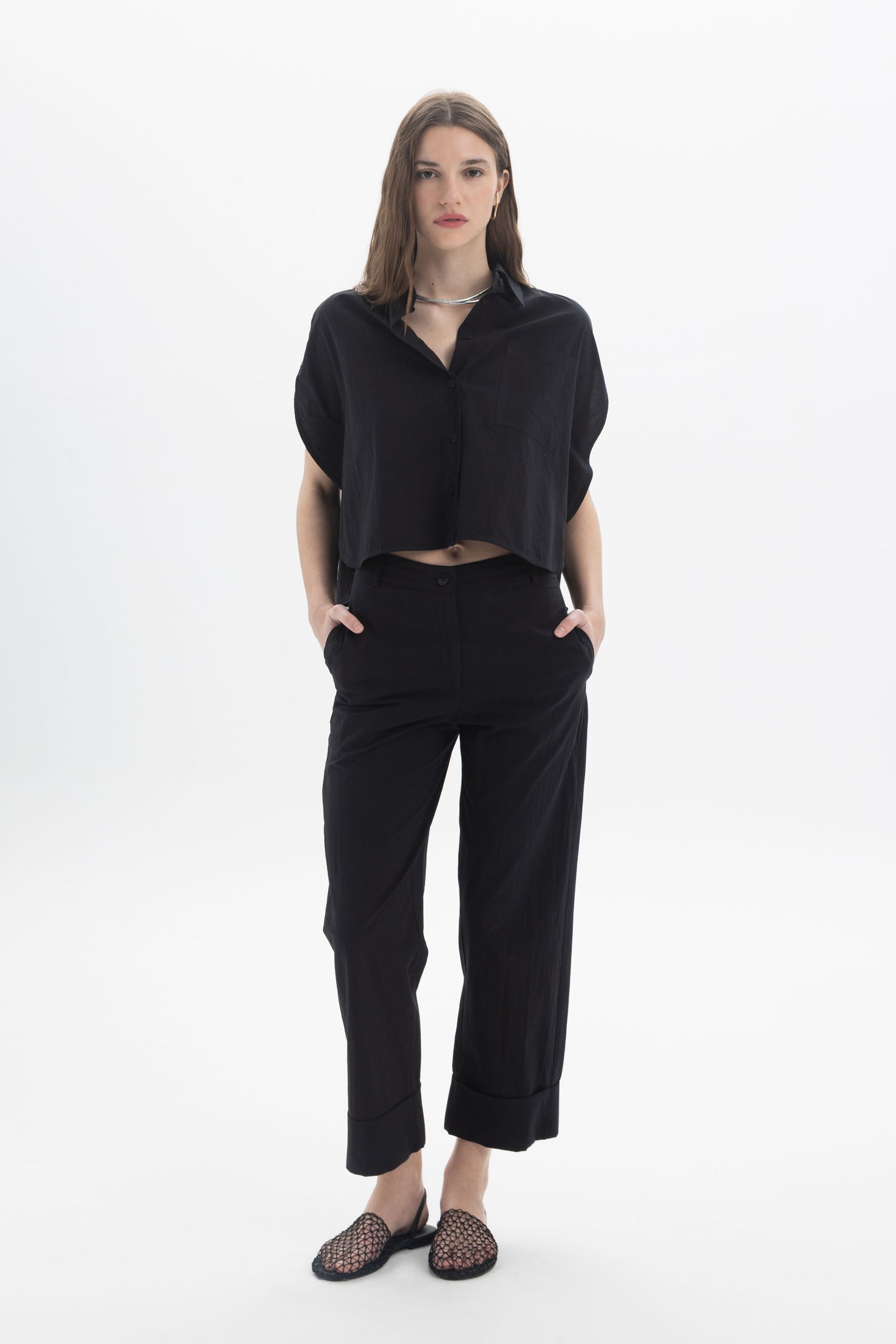 Cropped Button Shirt in black, featuring a loose fit, classic collar, and short cap sleeves for modern summer style.
