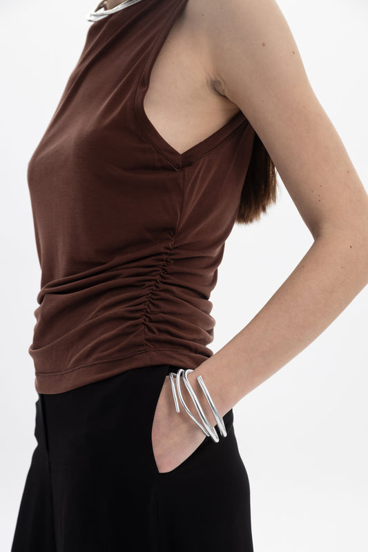 Ruched Sleeveless Top in brown with side ruching, high neckline, styled with silver jewelry.