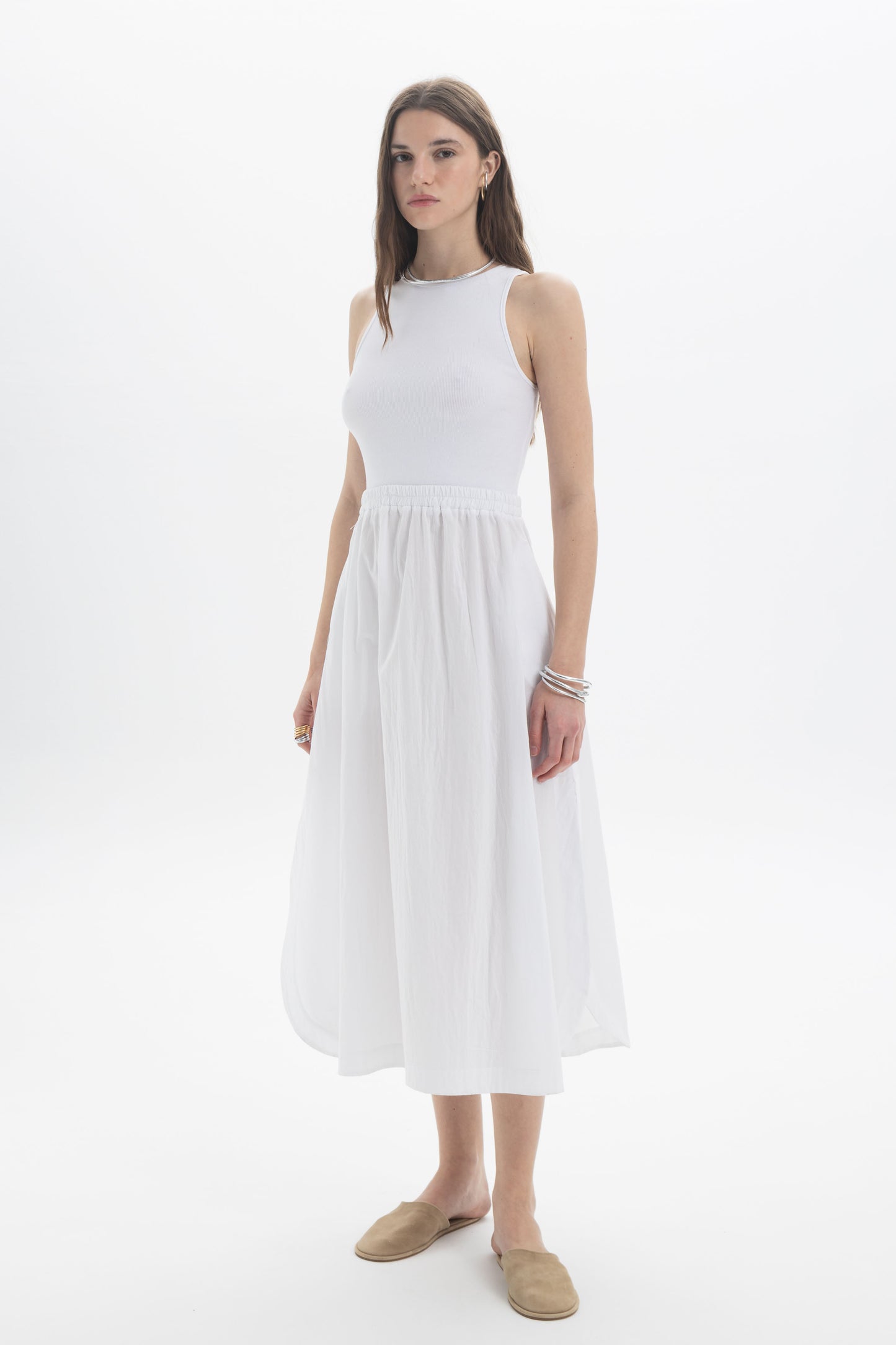 Rib Tank Midi Dress featuring a sleeveless bodice and softly gathered skirt for a modern, versatile look.