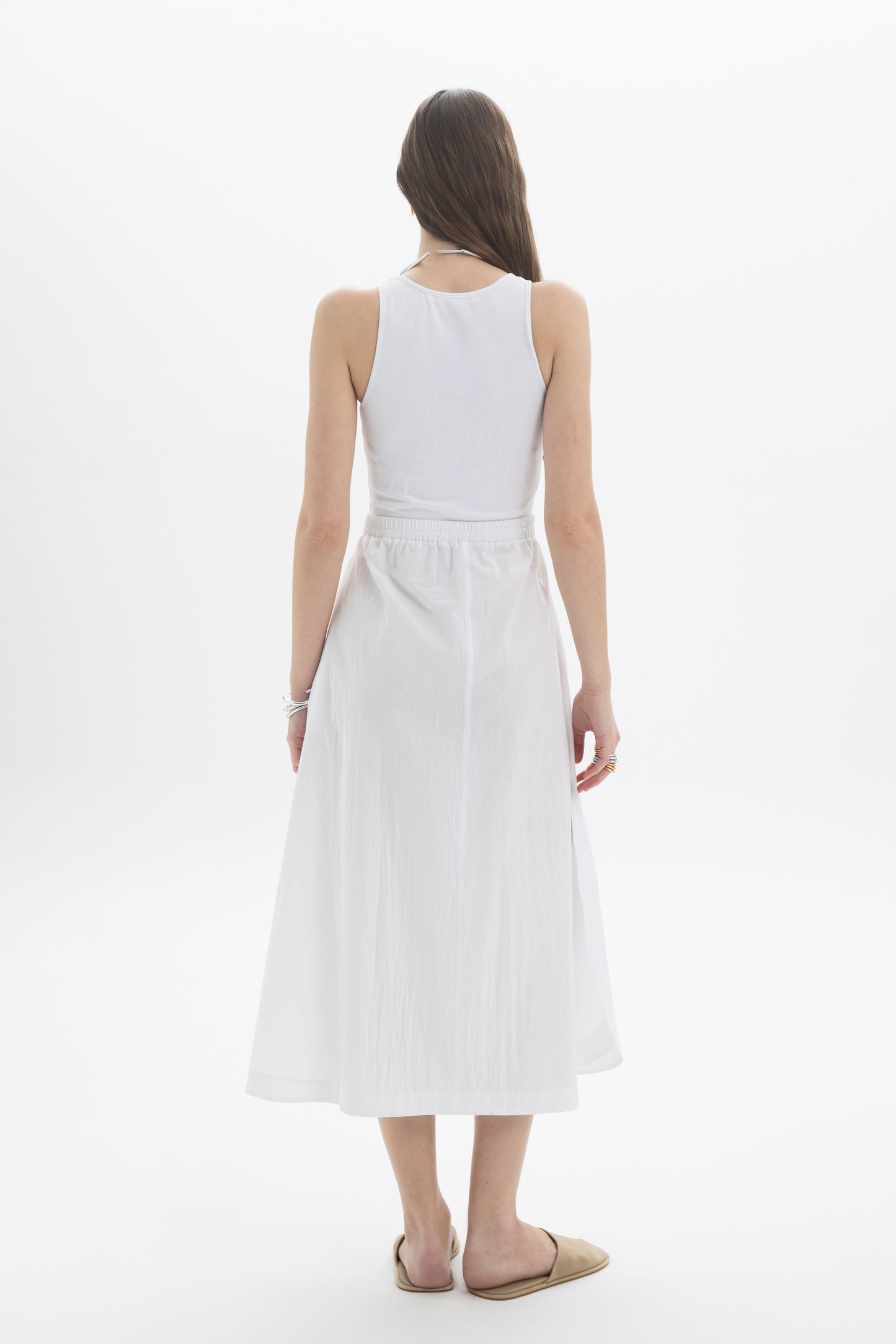 Rib Tank Midi Dress showcasing a fitted bodice and flowing skirt from a back view in white color.