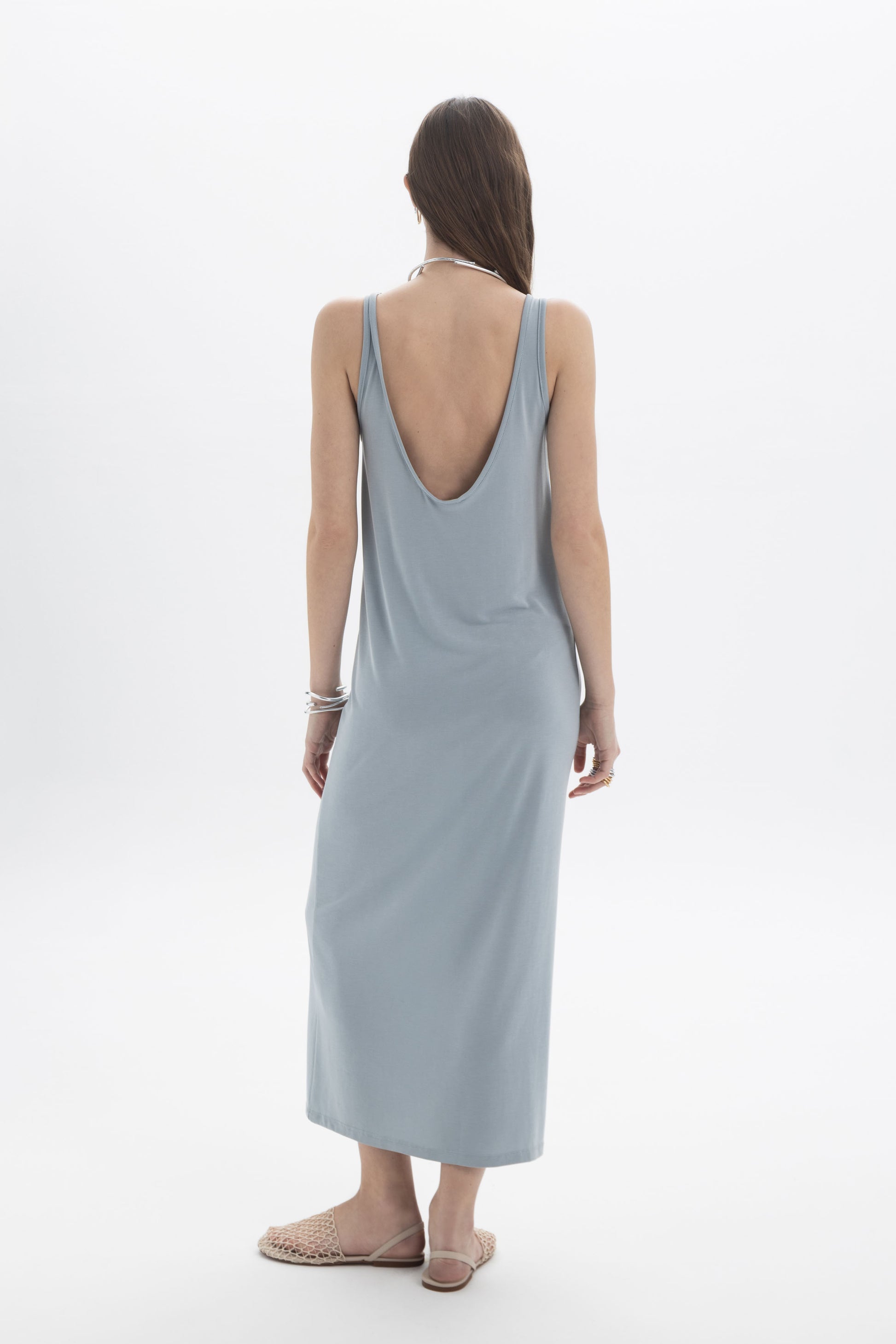 Open Back Tank Dress showcasing a sleeveless design with a deep open back, perfect for warm days and easy layering.