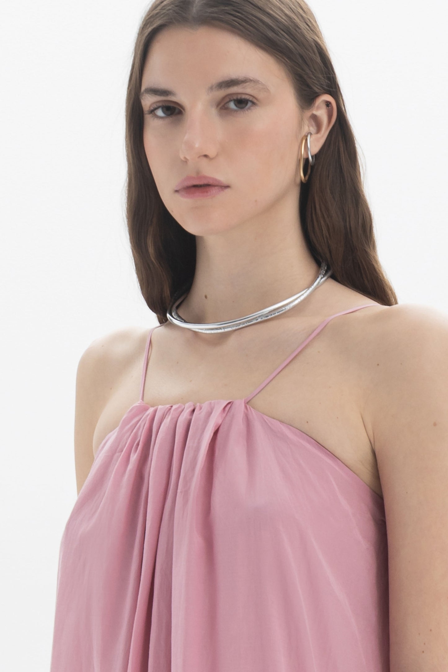 Fashion model wearing a Gathered Strap Midi Dress with delicate straps and a softly gathered neckline.