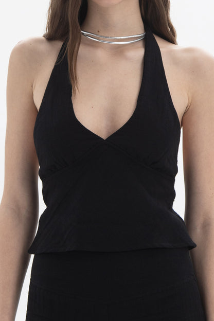 Halter Neck Fitted Top in black with deep V neckline and open back, highlighting shoulders and waist.