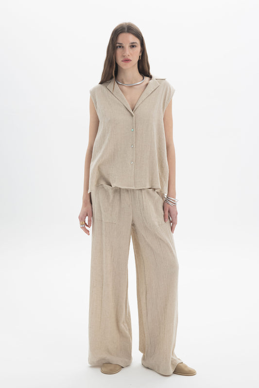 Sleeveless Textured Collar Blouse in beige with soft collar and relaxed fit, perfect for effortless summer style.