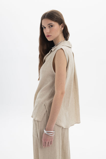 Sleeveless Textured Collar Blouse in light fabric, showcasing a relaxed fit and soft collar neckline.