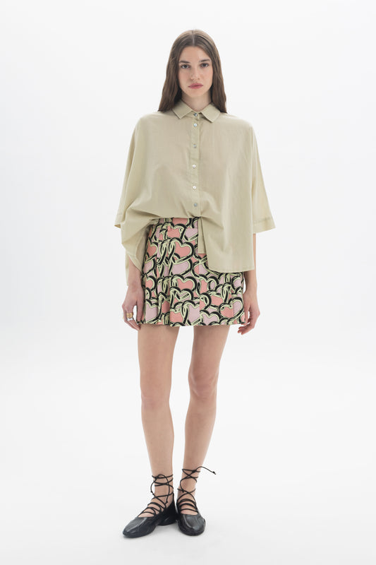 Elbow Length Shirt styled with a printed skirt, featuring a relaxed fit, classic collar, and wide elbow-length sleeves.