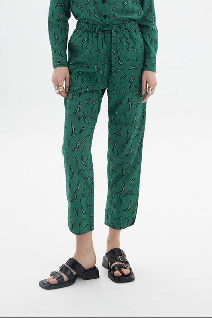 Cropped Drawstring Trousers featuring an all-over green chili pepper print and adjustable waistband.