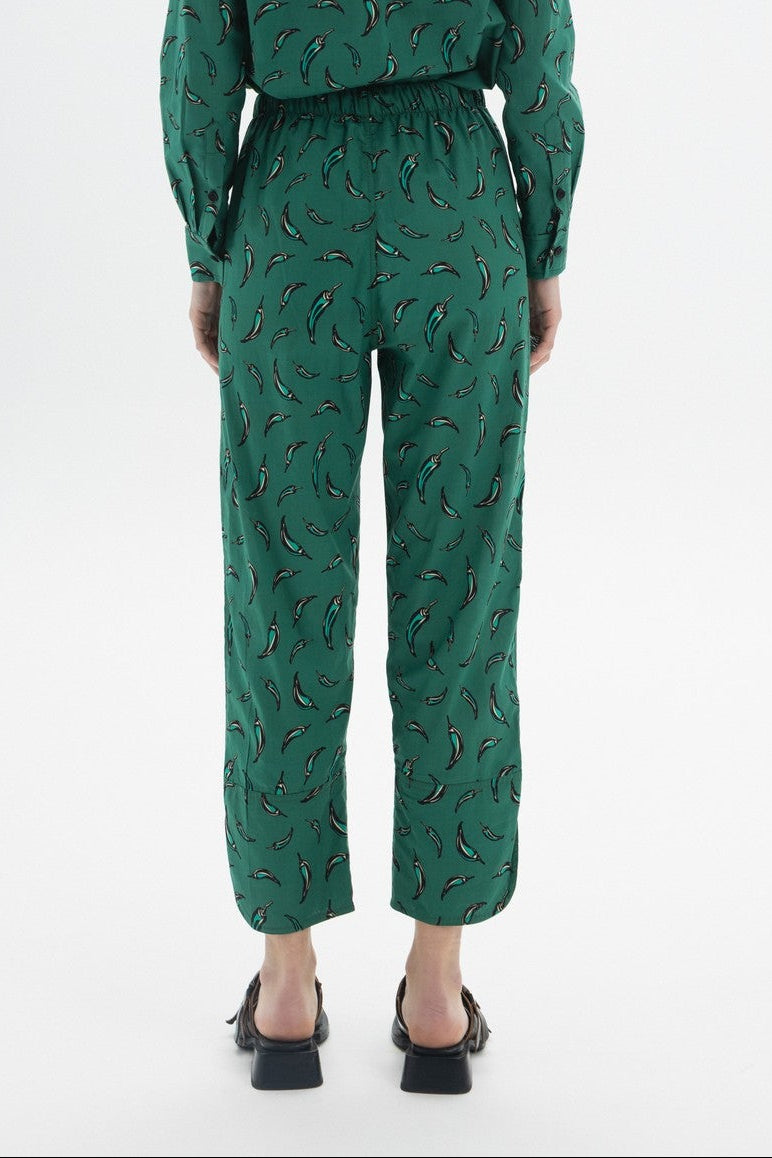Cropped Drawstring Trousers featuring a green chili pepper print and an elastic waistband for comfort.