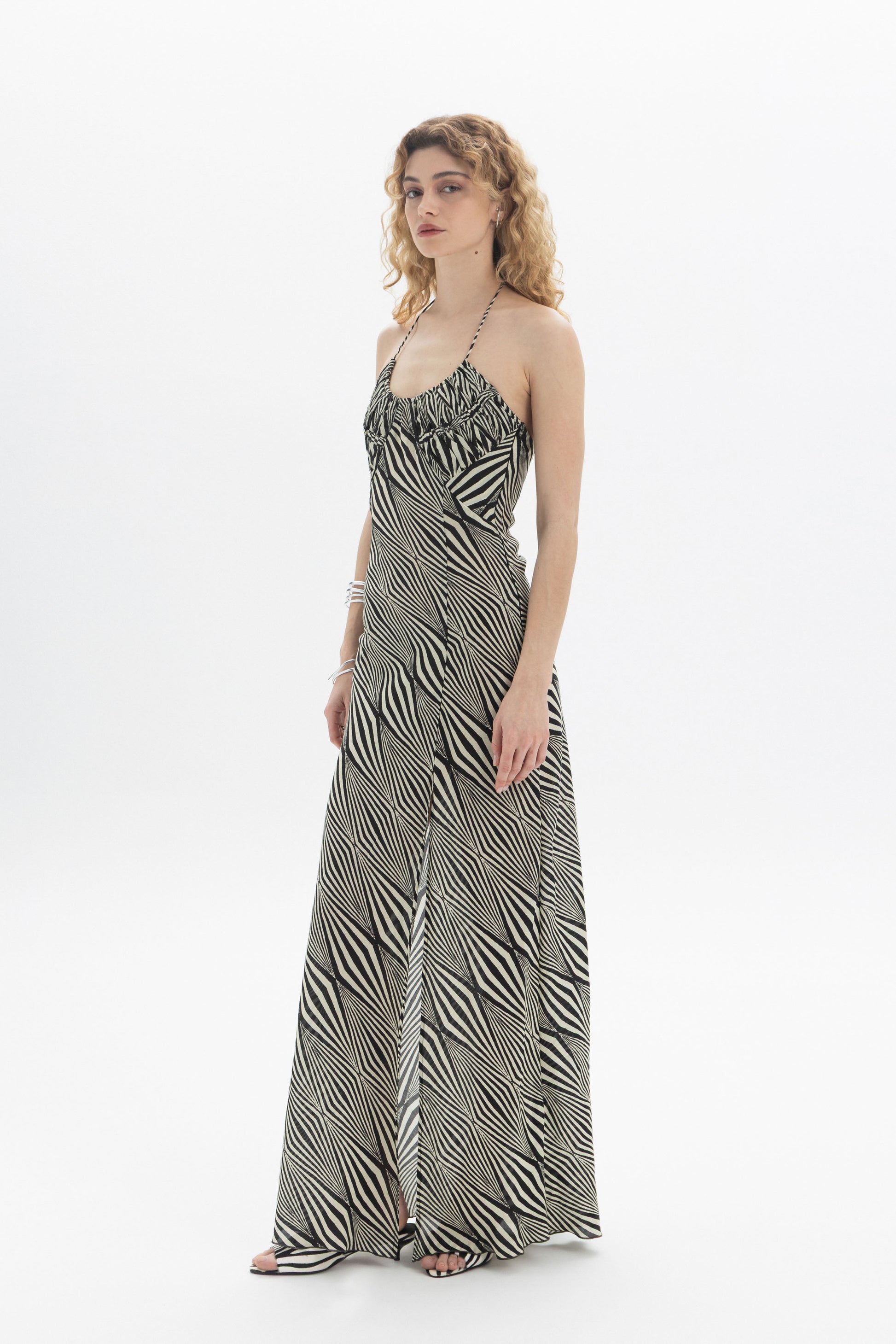 Print Halter Dress featuring a gathered neckline and floor-length skirt in black and ecru graphic print.