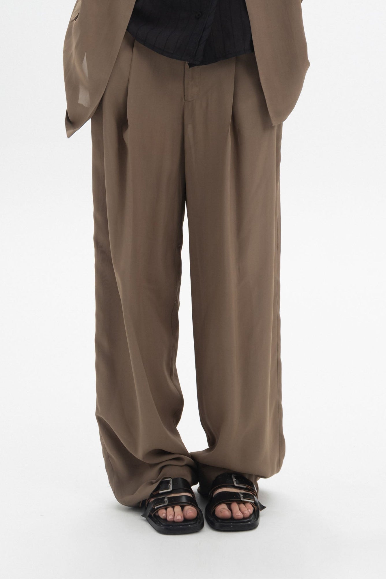 Fluid Tailored Trousers in a relaxed fit with soft drape and clean tailoring.