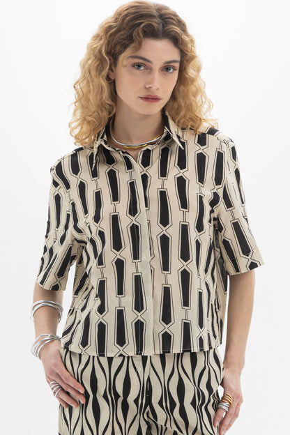 Short Sleeve Shirt featuring a classic collar and bold geometric print on a relaxed silhouette.