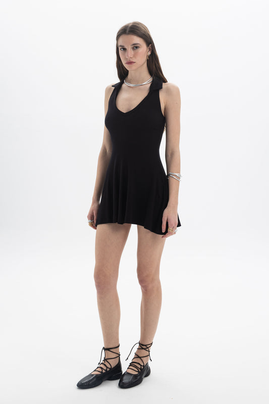 B&B x F Collared Mini Dress on a model showcasing its deep V neckline and flared skirt design.