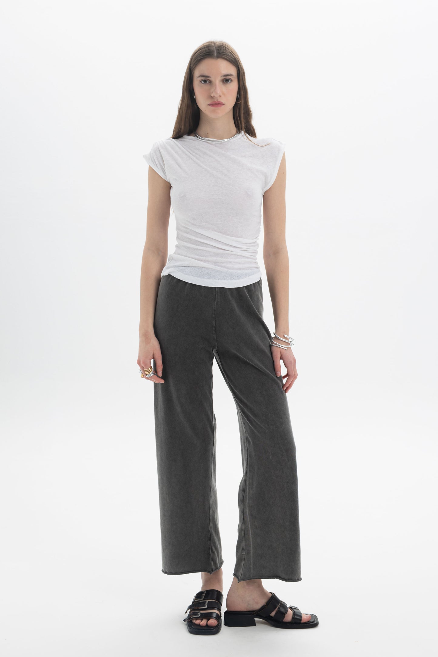 B&B x F Draped Cap Sleeve Top worn with wide-leg pants, showcasing a modern and effortless style.