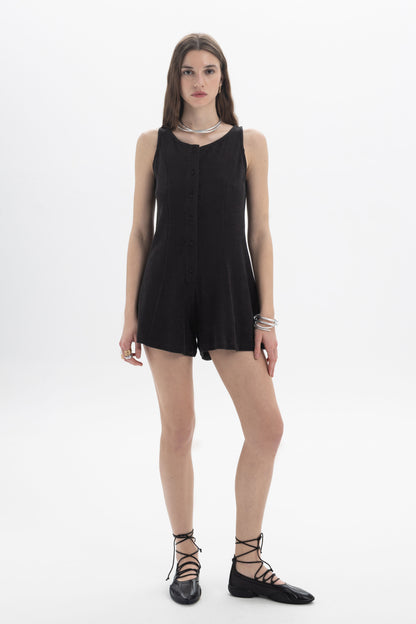 B&B x F Button Front Romper in a relaxed mini silhouette with button-front detail, perfect for day to evening styling.