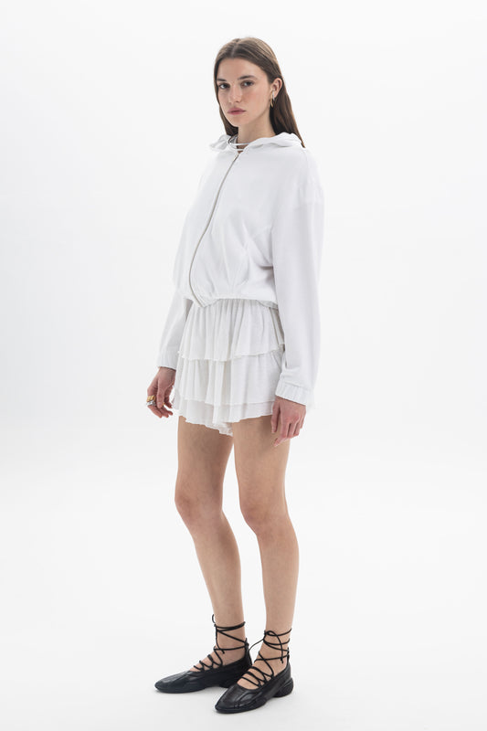 B&B x F Zip Hooded Jacket worn with layered skirt, showcasing a modern sporty style in a white color.