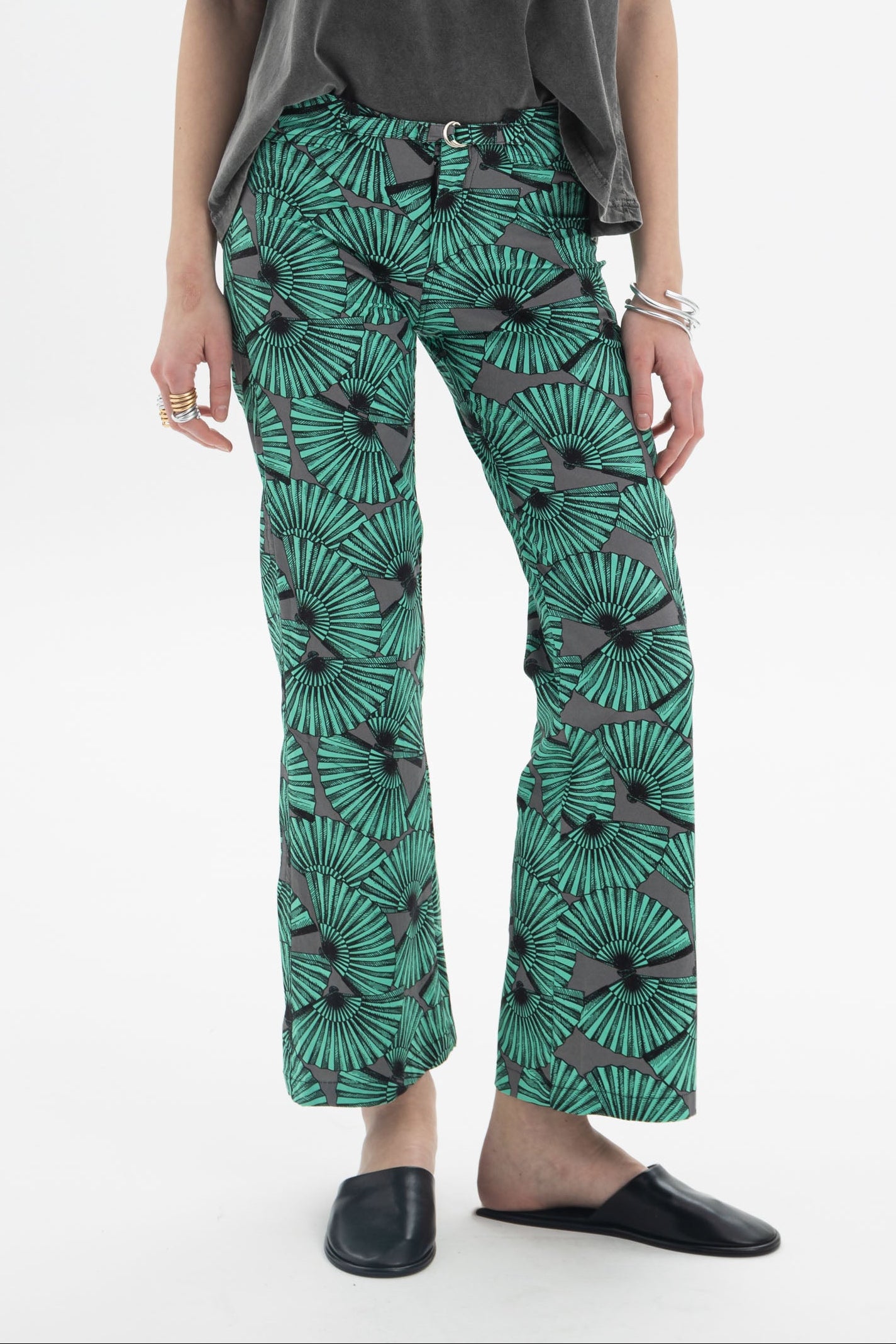 Model wearing Graphic Print Cropped Pants with a bold fan-inspired print and straight silhouette.