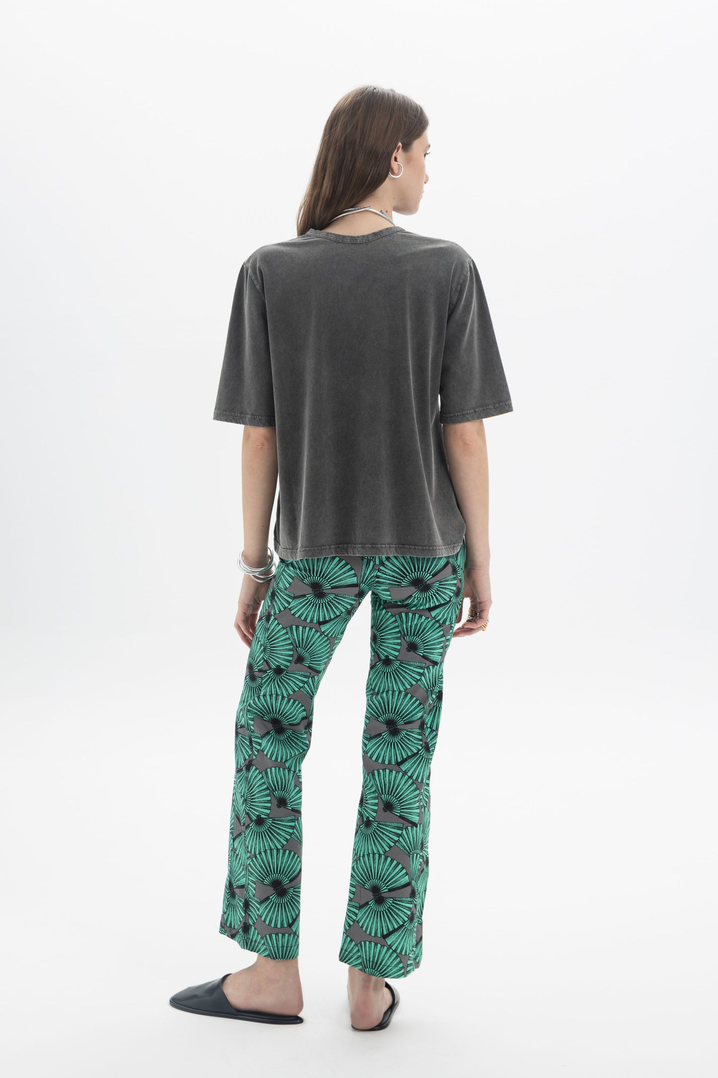 B&B x F Washed Relaxed T-Shirt model wearing relaxed T-shirt with green patterned pants.