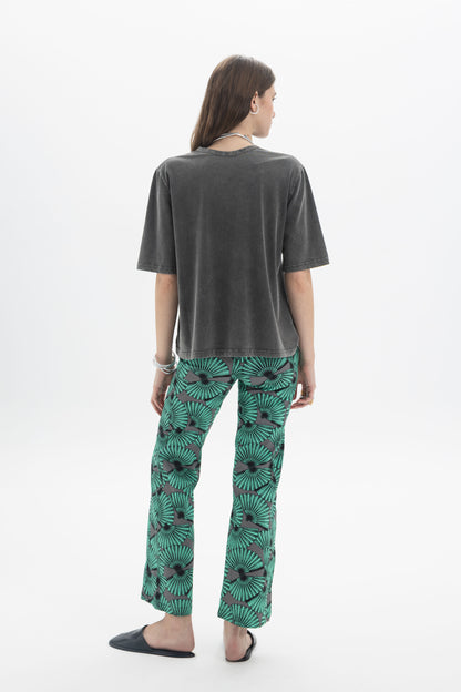 B&B x F Washed Relaxed T-Shirt model wearing relaxed T-shirt with green patterned pants.