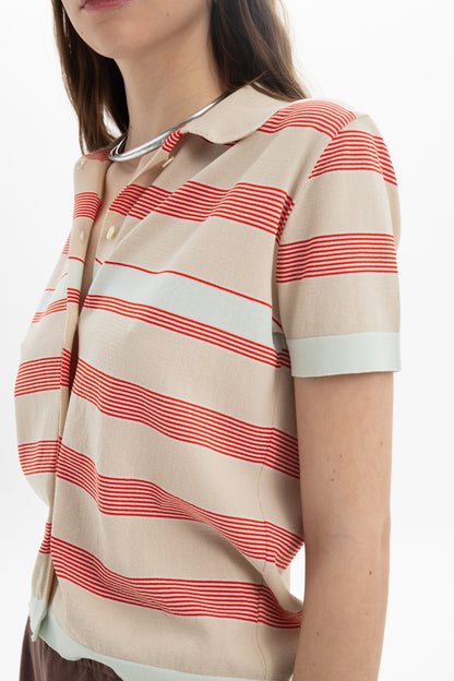 Striped Knit Polo featuring a soft collar and relaxed silhouette with a horizontal stripe pattern.