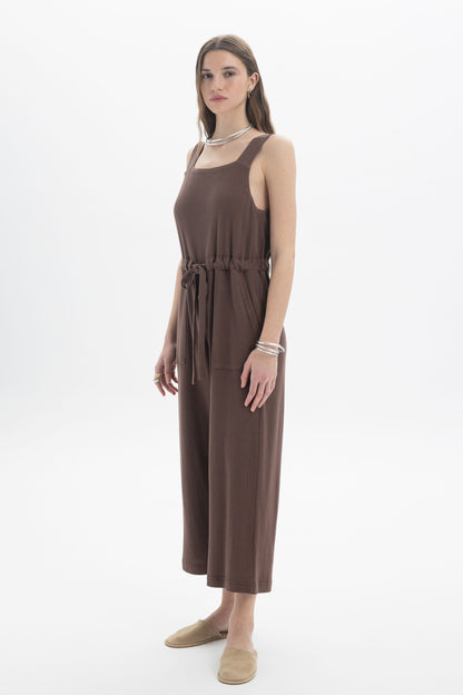 B&B x F Belted Jumpsuit showcasing a sleeveless design and adjustable drawstring waist in a relaxed silhouette.