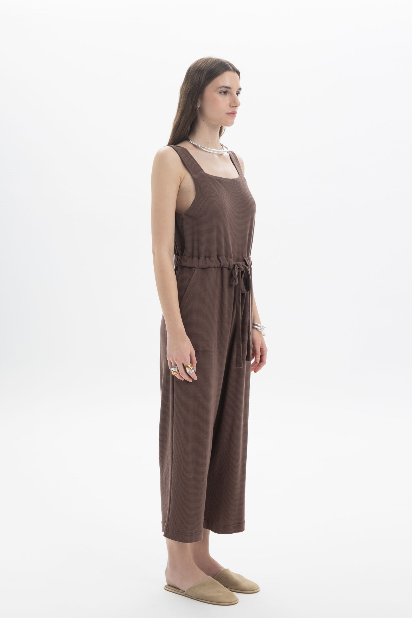 B&B x F Belted Jumpsuit in brown, featuring a square neckline and adjustable drawstring waist for a structured look.