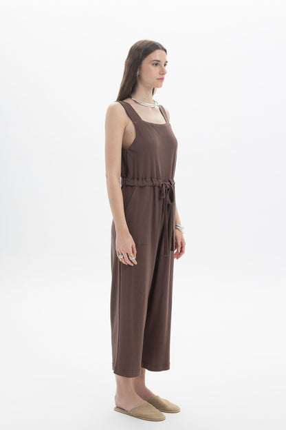 B&B x F Belted Jumpsuit in brown, featuring a square neckline and adjustable drawstring waist for a structured look.