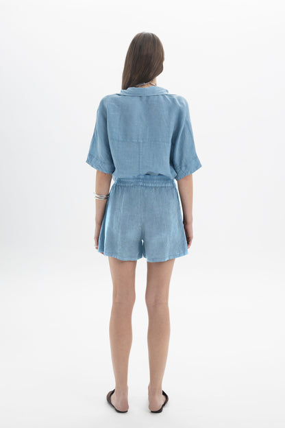 Black and Black linen shorts with a relaxed fit, featuring a comfortable waistband and light, breathable fabric.