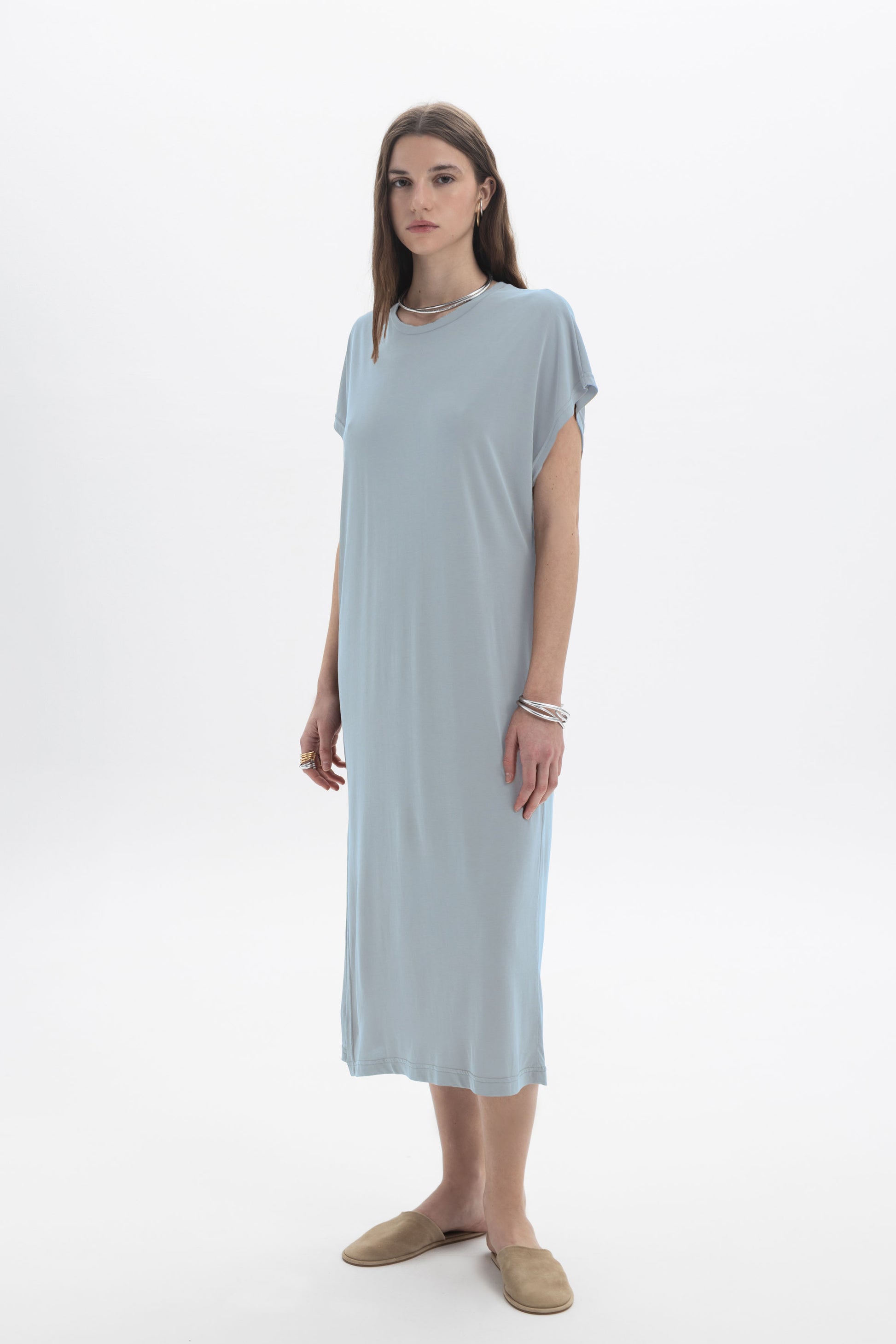 Black and Black relaxed midi dress with a flowing silhouette and short sleeves, perfect for casual or semi-formal occasions.