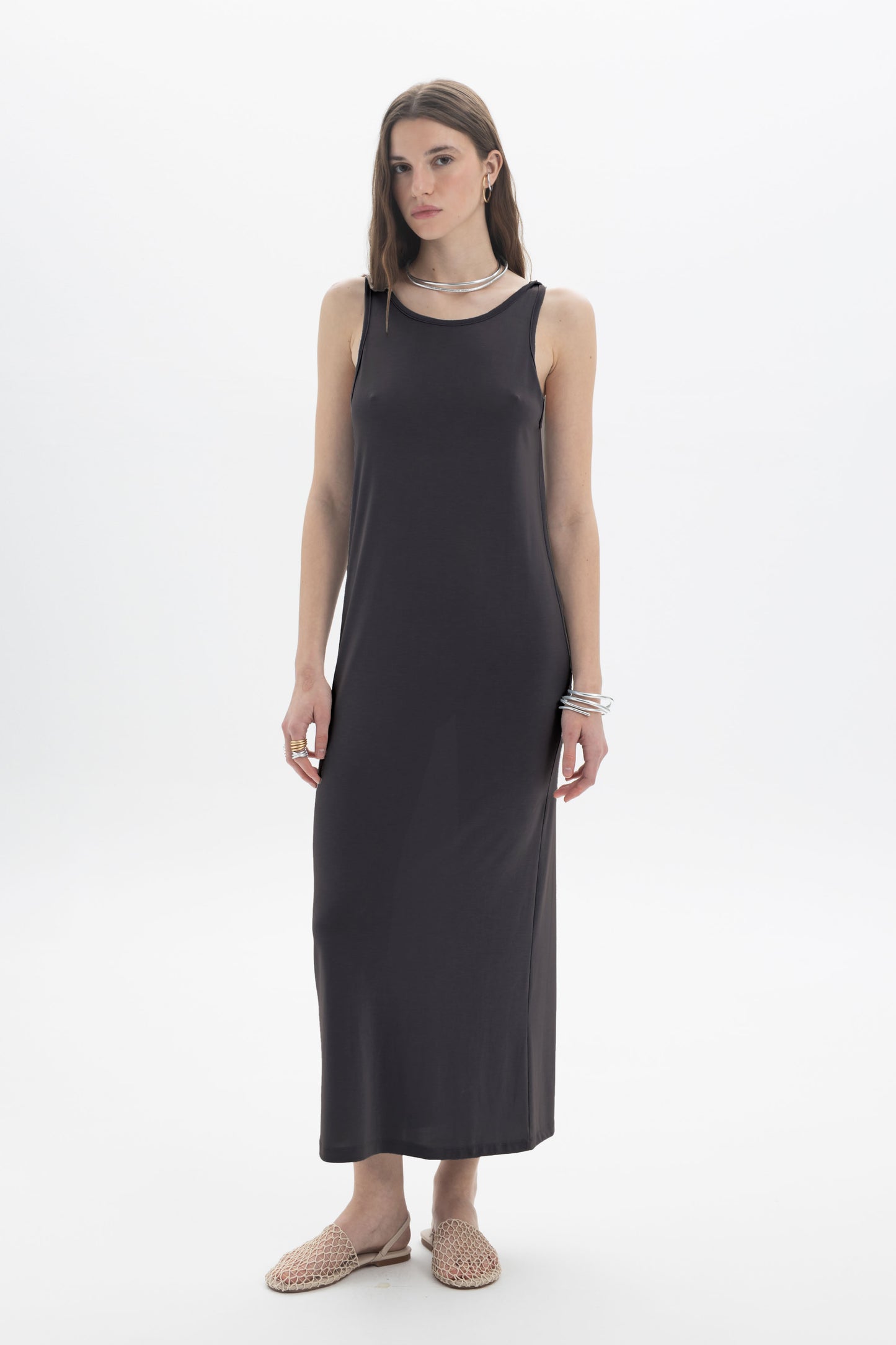 Black and Black open back tank dress displayed on a hanger with a sleeveless design and stylish open back detail.