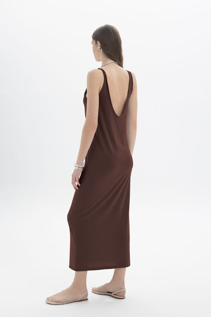 Black and Black open back tank dress displayed on a hanger, featuring a sleeveless design and stylish open back detail.