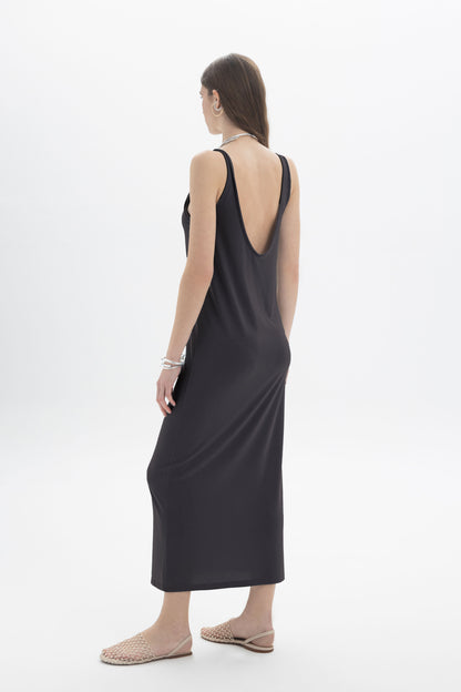 Black and Black open back tank dress with a flowy fit, sleeveless design, and stylish open back detail.