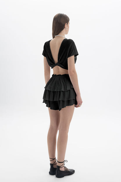 Black and Black B&B x F Twist Back Crop Top, front view showing the fitted black crop top with twist back detail.