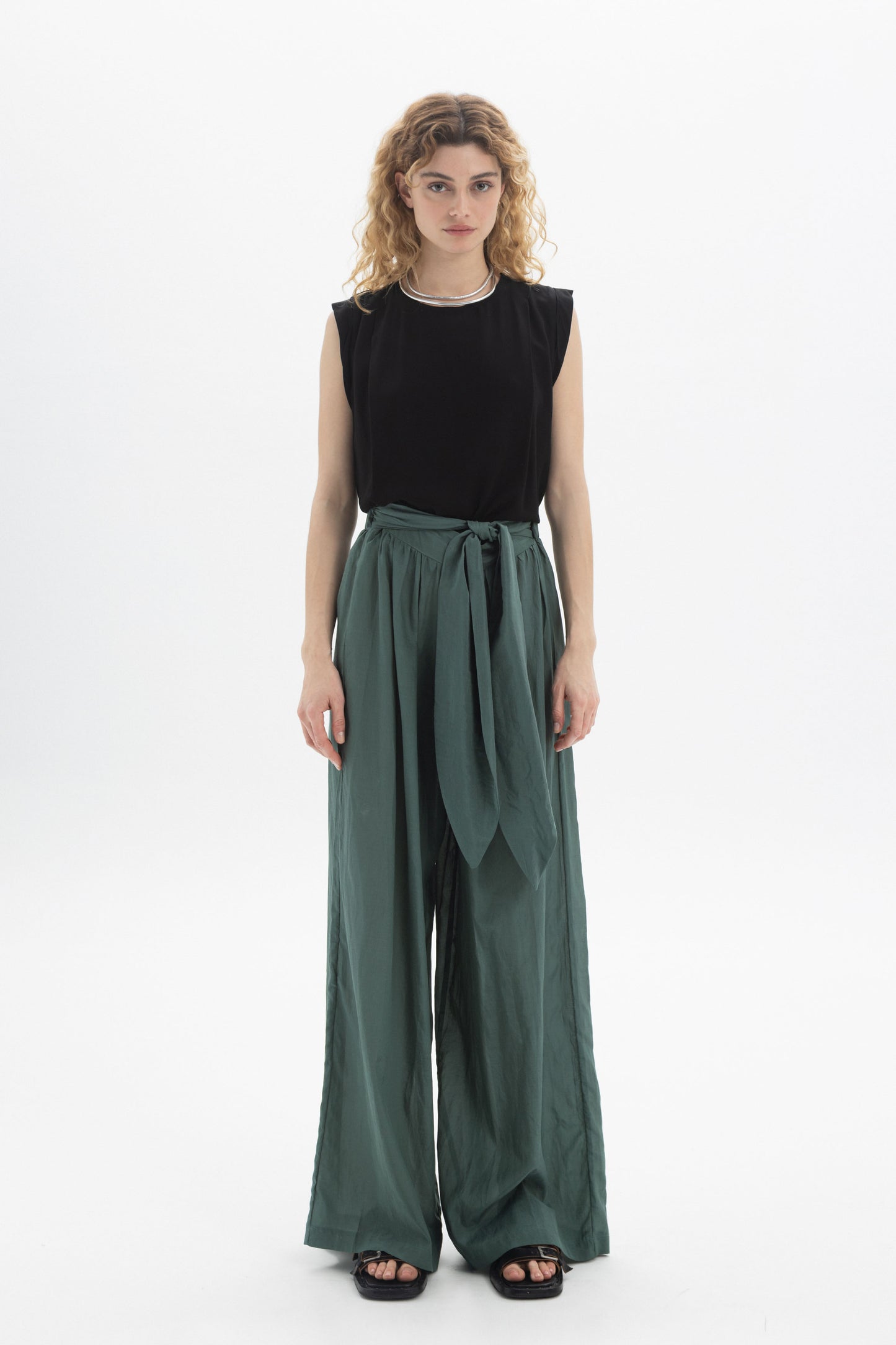 Wide-Leg Belted Pants in a relaxed fit with a matching fabric belt and stylish black top.