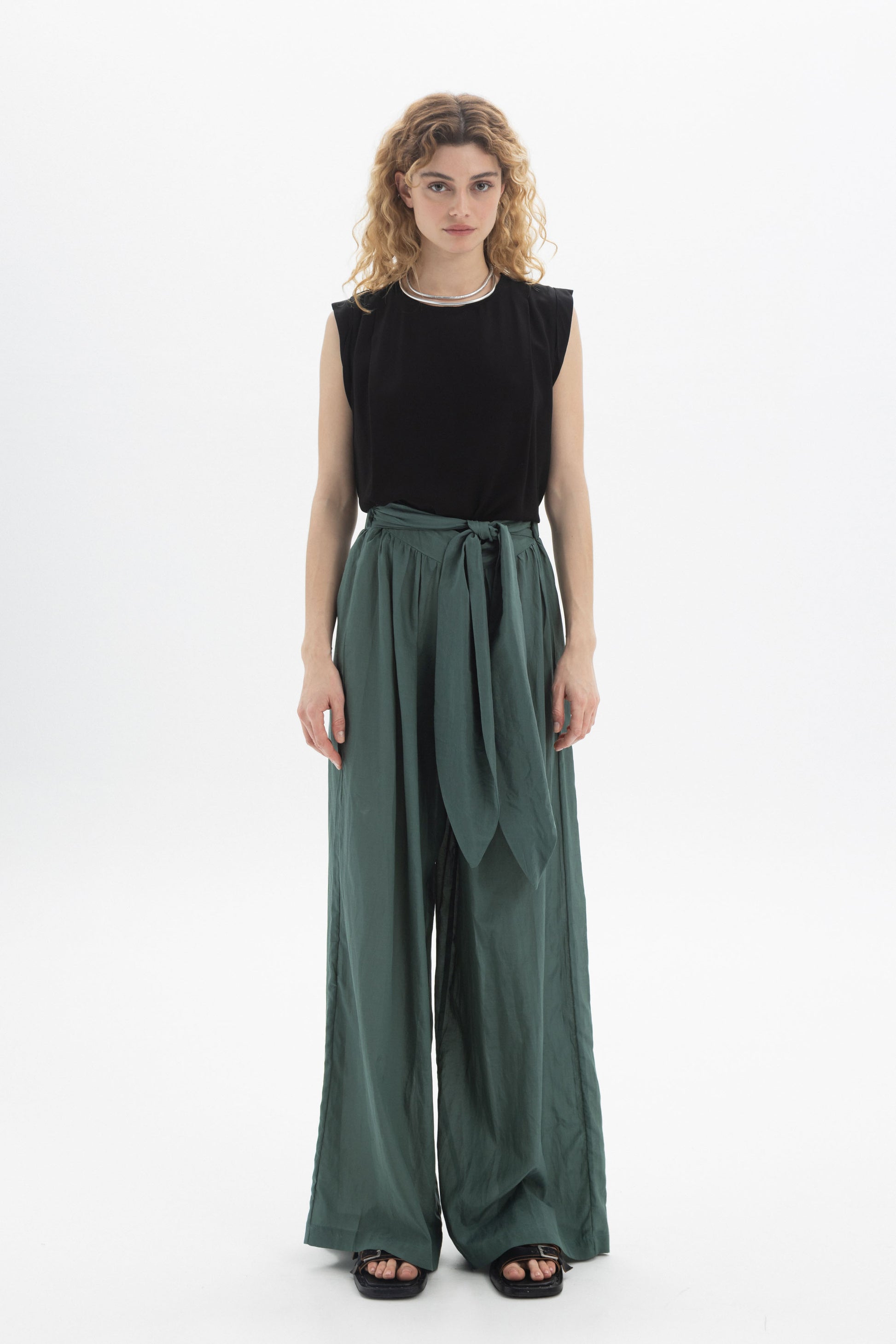 Wide-Leg Belted Pants in a relaxed fit with a matching fabric belt and stylish black top.