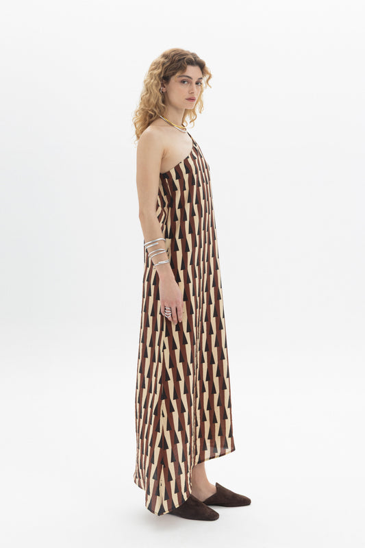 One-Shoulder Maxi Dress featuring an asymmetric neckline and fluid structure, perfect for effortless movement.