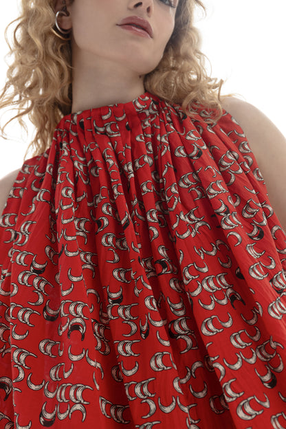 Draped High-Neck Top featuring a gathered high neckline and fluid drape in a vibrant red fabric.