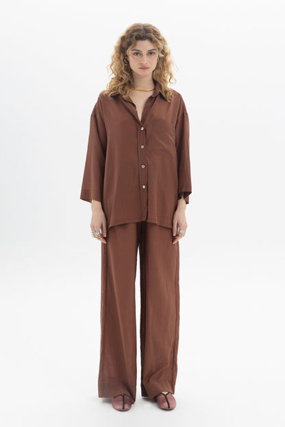 Relaxed Button-Up Shirt in brown with soft collar, dropped shoulders, and chest pocket, ideal for a laid-back style.
