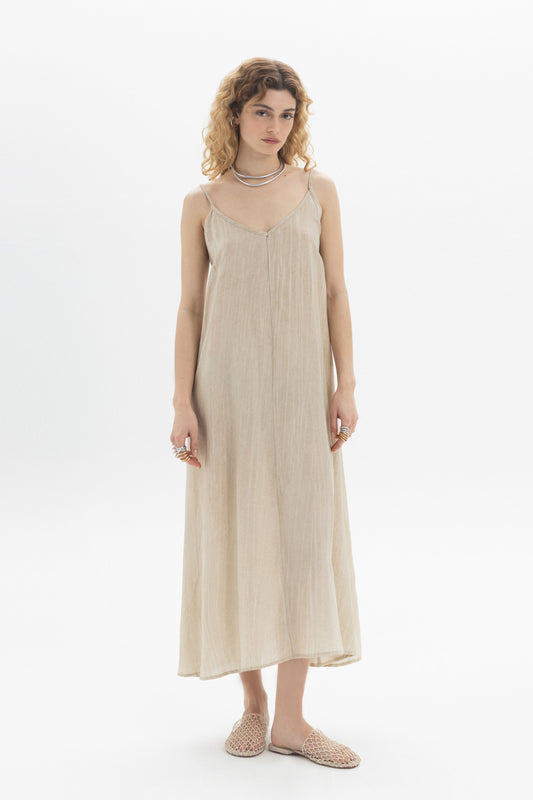 Long Slip Dress featuring thin straps and a soft V-neckline, designed for a relaxed fit.