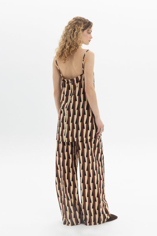 Longline Cami featuring thin straps, geometric print, and relaxed fit, showcased on a model from the back.