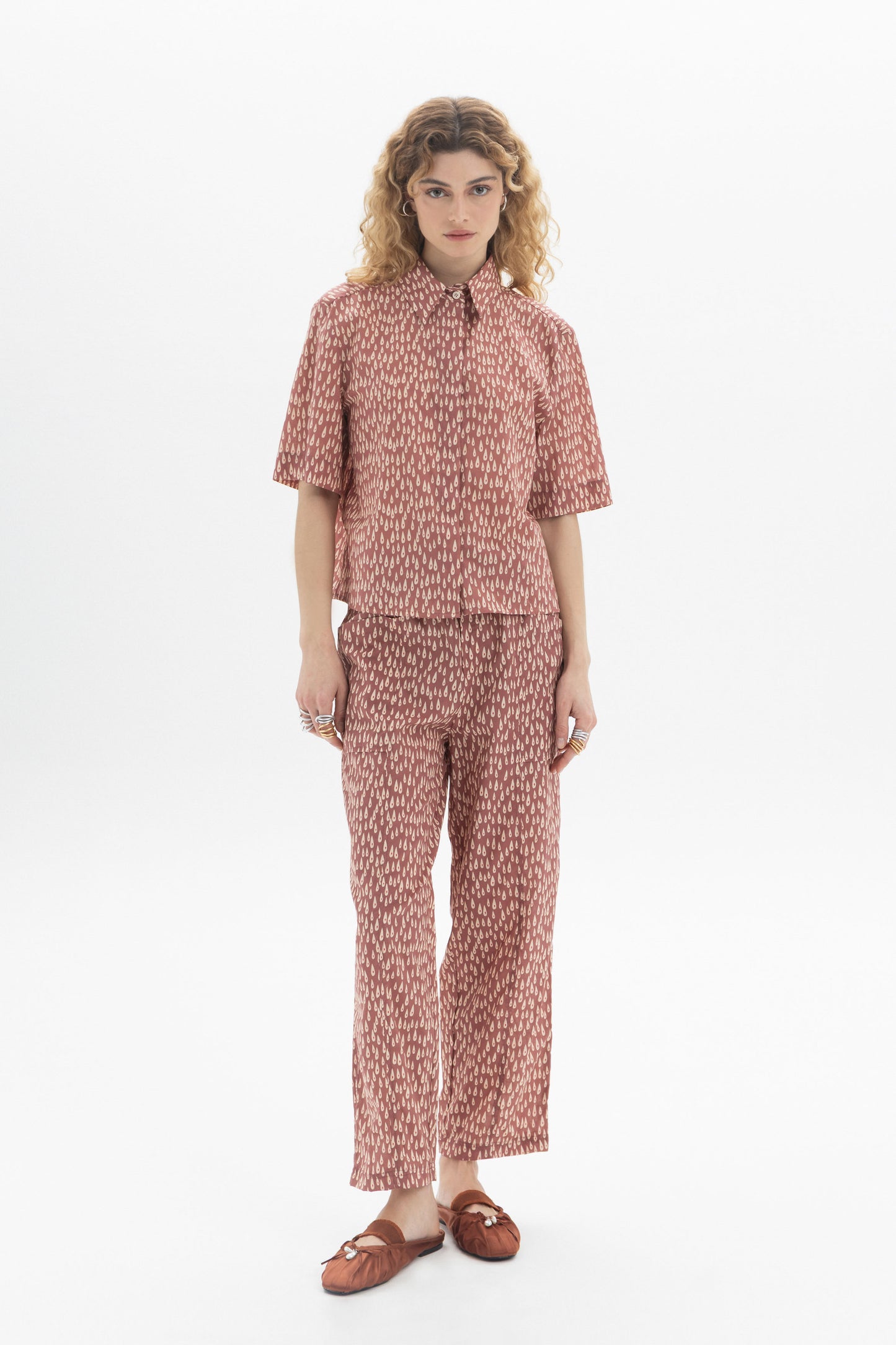 Short Sleeve Shirt featuring a classic collar, front button closure, and all-over abstract drop print in relaxed fit.