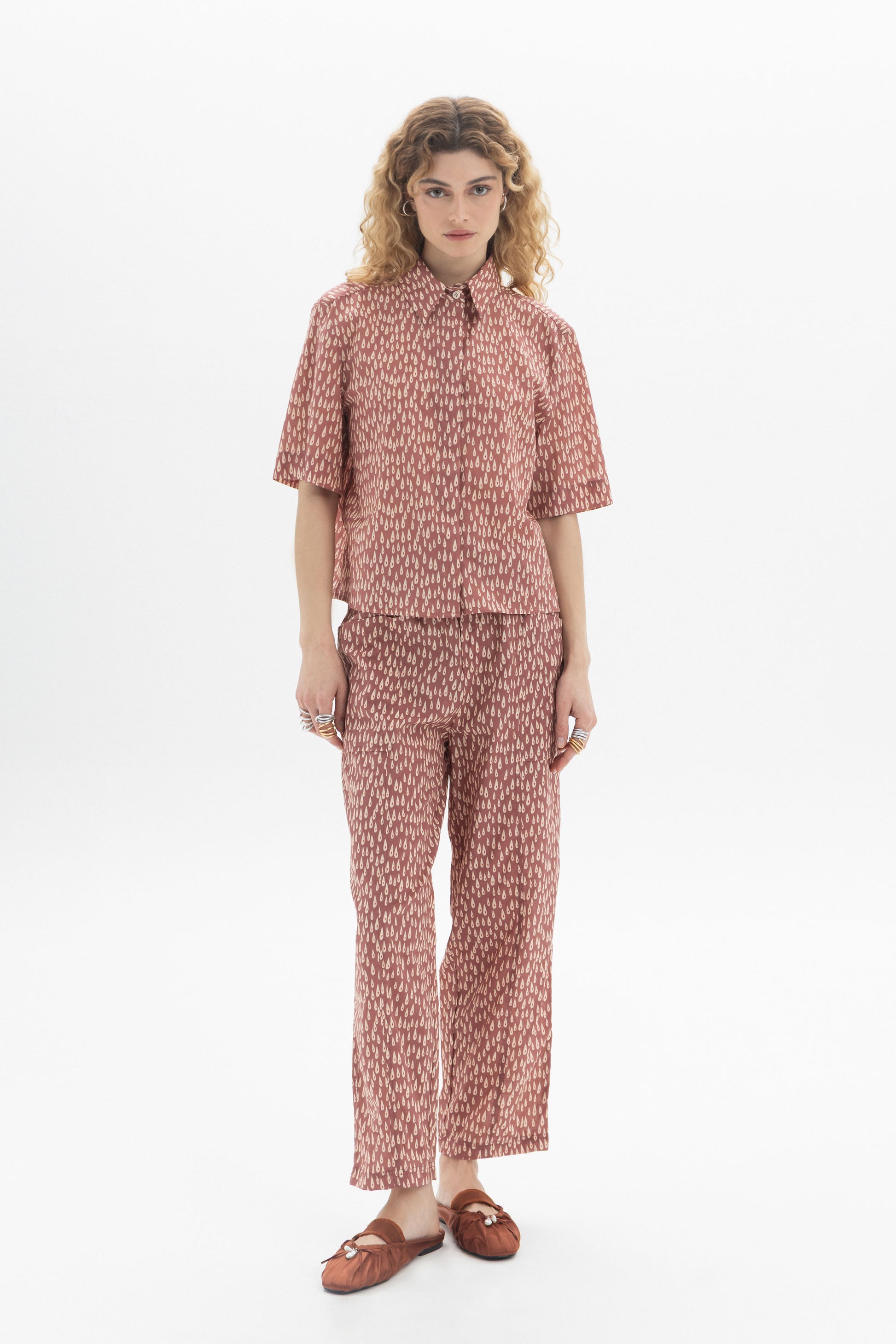 Short Sleeve Shirt featuring a classic collar, front button closure, and all-over abstract drop print in relaxed fit.