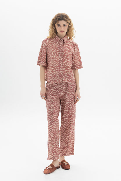 Short Sleeve Shirt featuring a classic collar, front button closure, and all-over abstract drop print in relaxed fit.
