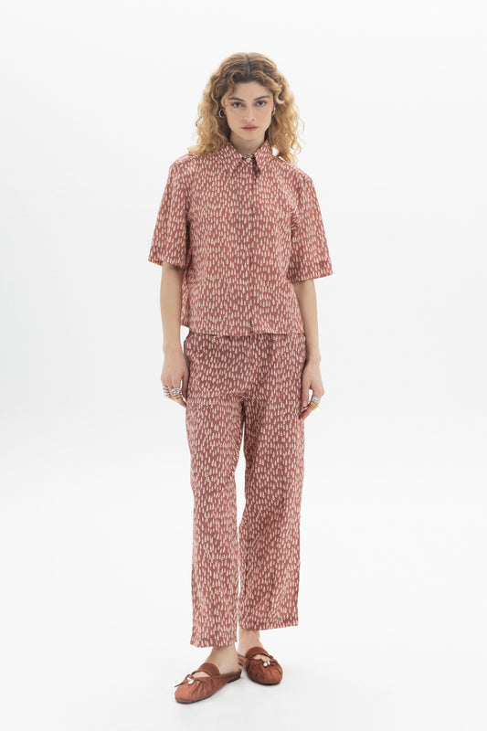 Short Sleeve Shirt featuring a classic collar, front button closure, and all-over abstract drop print in relaxed fit.
