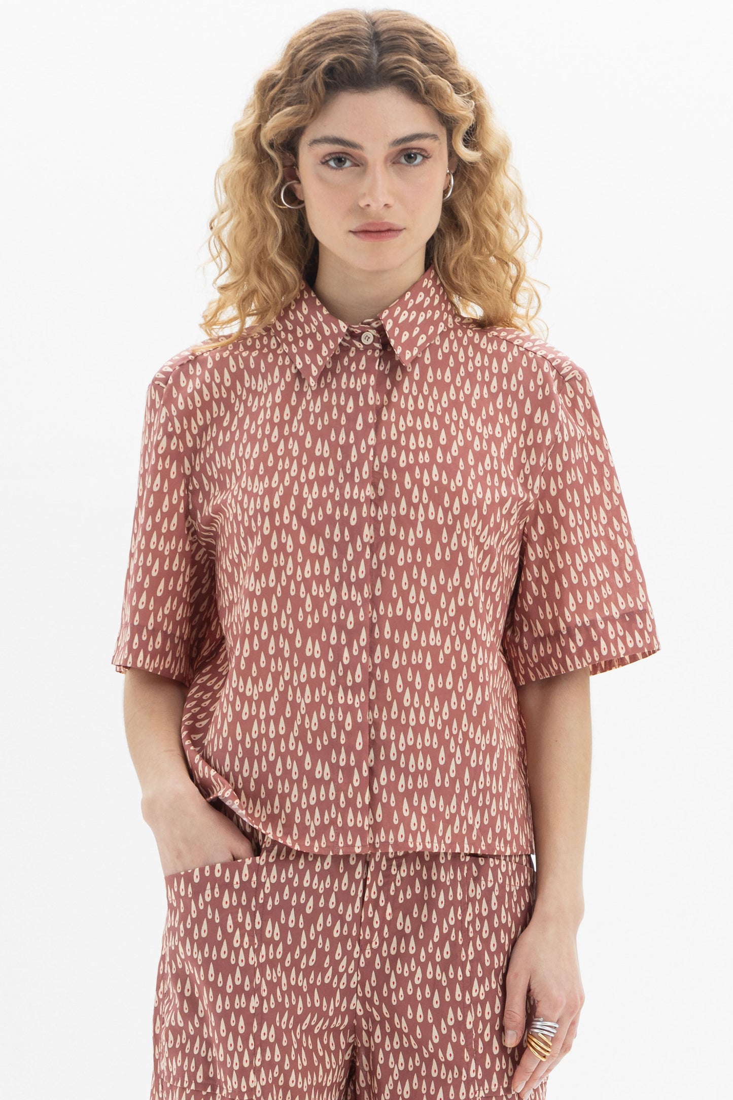 Short Sleeve Shirt featuring a classic collar and abstract drop print, designed in a relaxed fit.