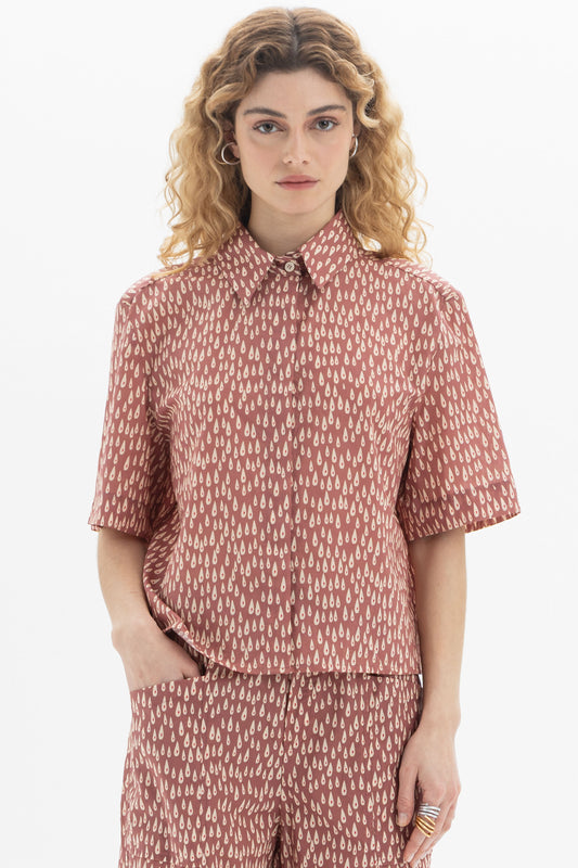 Short Sleeve Shirt featuring a classic collar and abstract drop print, designed in a relaxed fit.